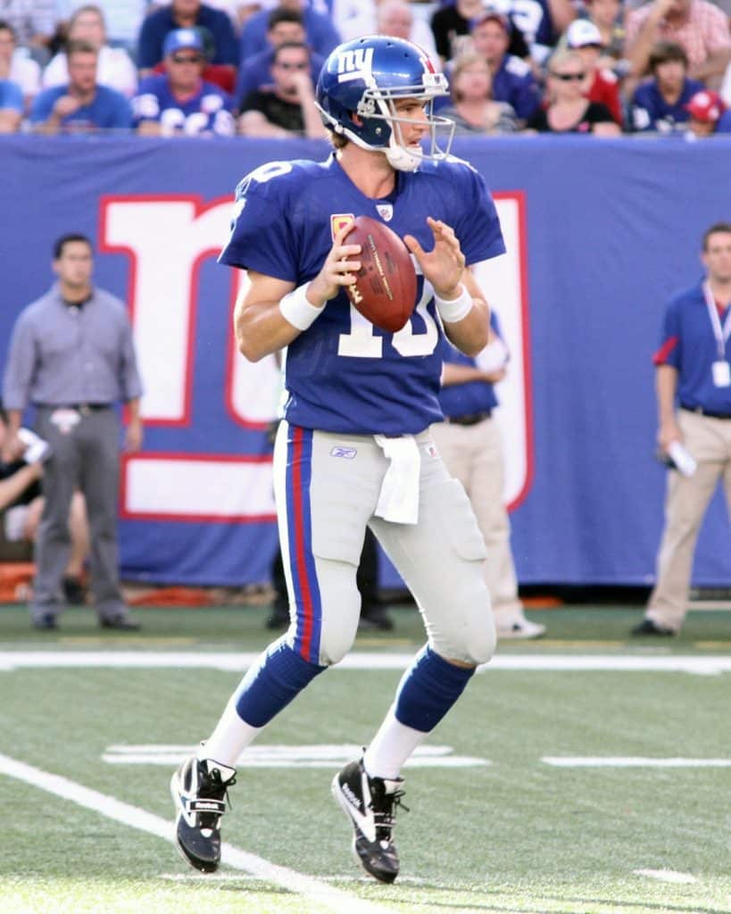 New York Giants former quarterback Eli Manning catches a ball - Giants vs Seattle Seahawks - October 9, 2011